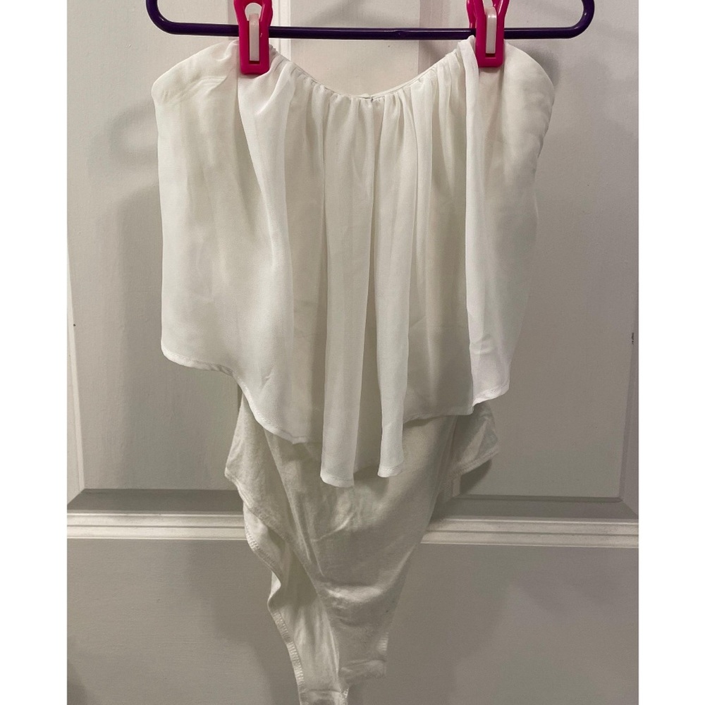 Charlotte Russe White Strapless Bodysuit in size XS